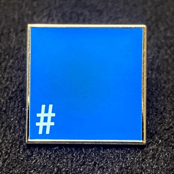 Blue-Square-Pin-White-Hashtag-on-Dark-Background